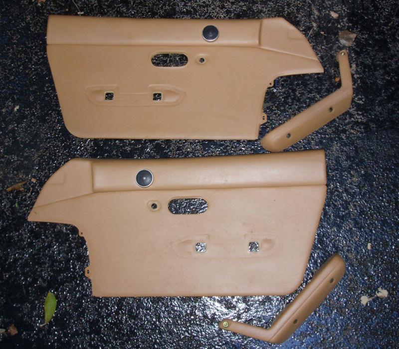 Set of 1993 mazda miata (na) interior door panels with tweeters and armrests