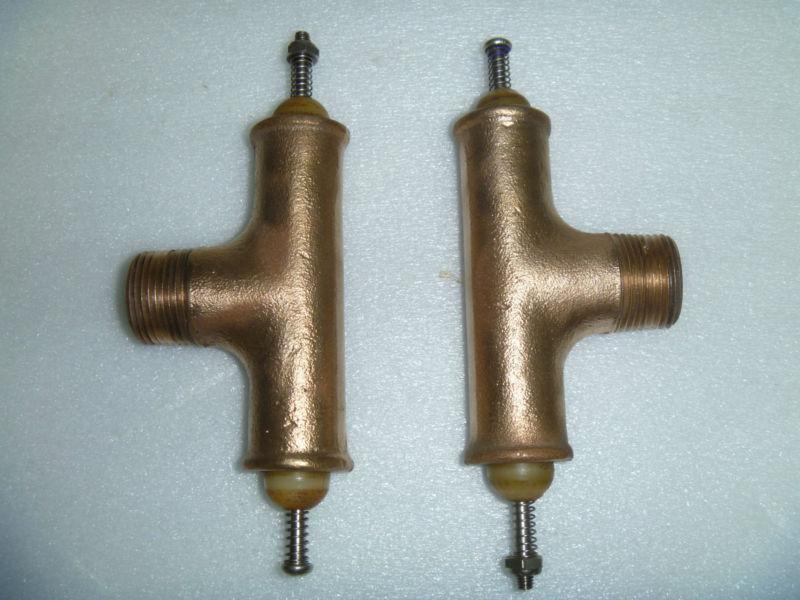 Mercruiser thermostat housing cover and a pair of tee ball valves