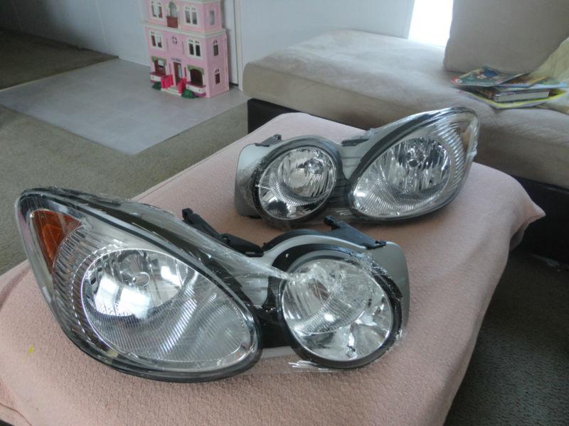 05-09 buick lacrosse left & right headlamp assemblies (pair)