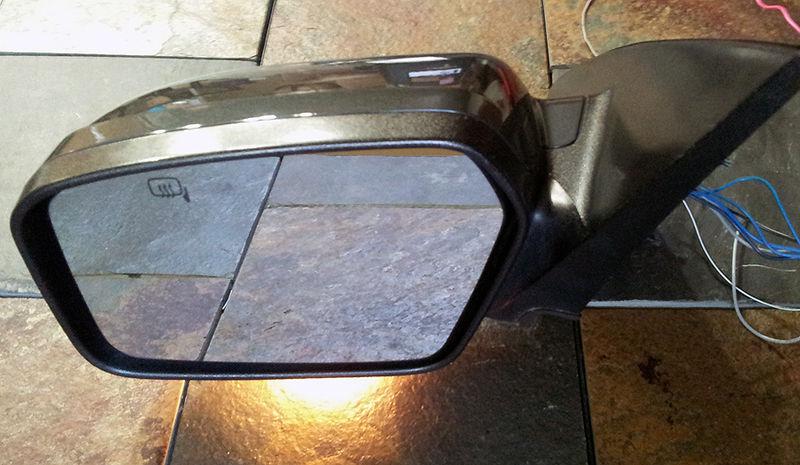 Mercury milan ford fusion folding heated side mirror w/approach courtesy light