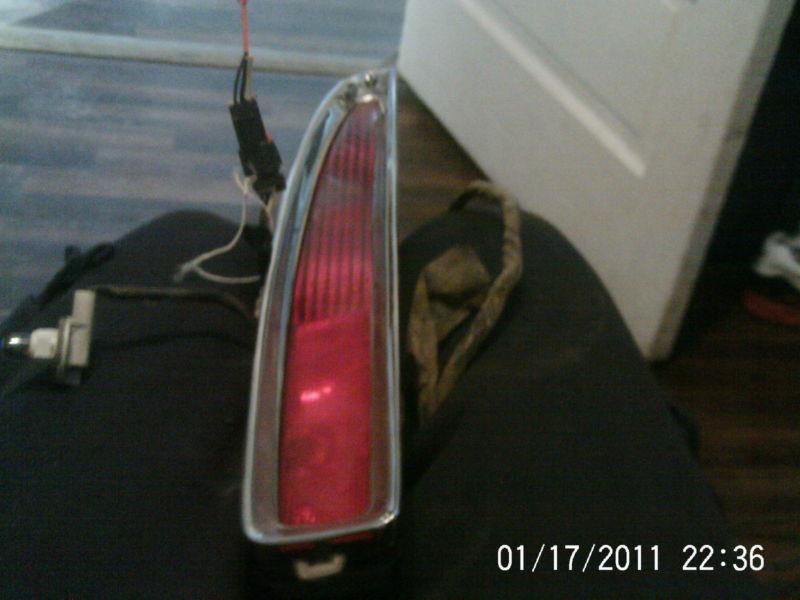 1994-99 cadillac deville lh tail lamp w/bezel and wiring