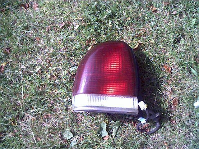 Used lh s driver's left tail light 94-97 chrysler complete w/con wire & bulbs