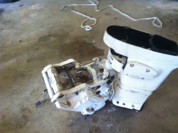 Mid section with trim/tilt assembly for a 1998 johnson 115 ficht outboard motor