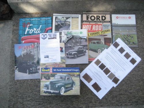 1940 ford  pile of books  complete model kit and std. hood handle   cheap