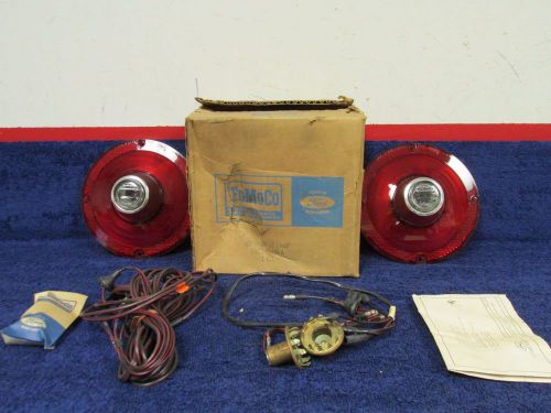 1964 ford fairlane 500  tail light lenses with backup package nice  nos ford 516