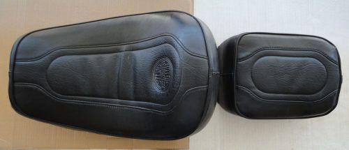 Oem harley davidson motorcycle seat 2-seater 4 bolt 2 pc. *not sure what bike*