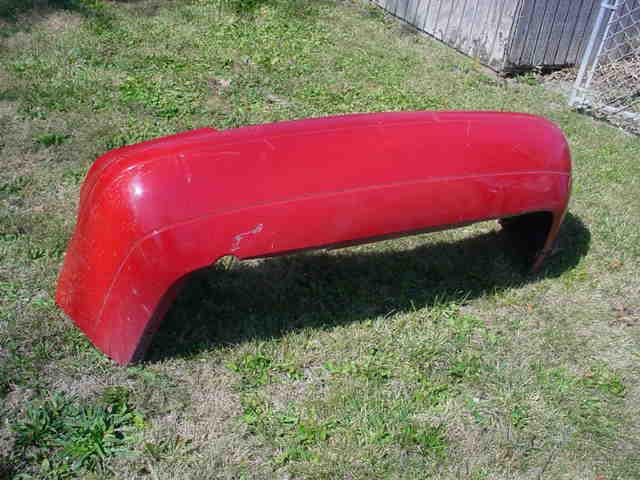 00 01 02 03 04  ford focus rear bumper assy, red, used