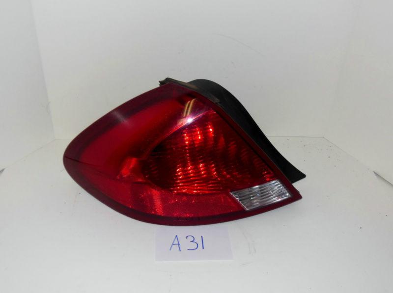 00 01 02 03 ford taurus left driver tail light  oem 