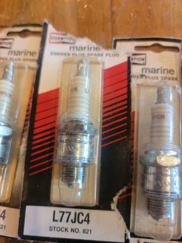 Champion johnson evinrude spark plug l77jc4 - set of 4, new old stock.