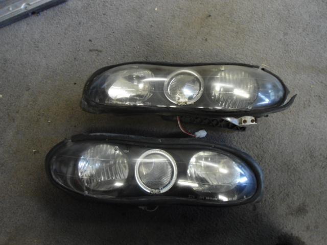 98-02 camaro ls1 headlights headlamps rh lh