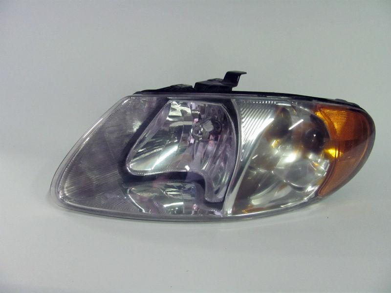 01 02 03 04 05 06 07 caravan town and country left headlight nice!