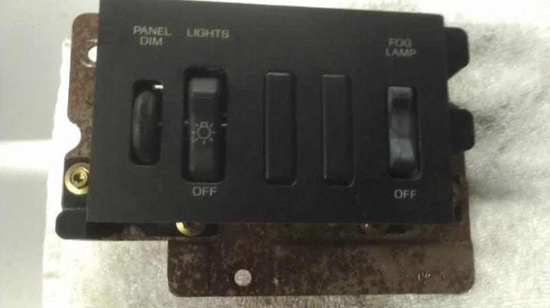 Fog light / headlight / interior dimmer switches w/panel thunderbird turbo coupe