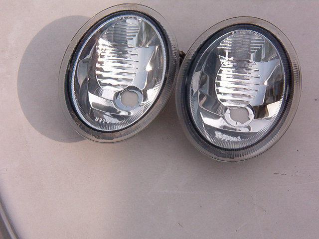 Pontiac grand am back up lights/lens housing   pair