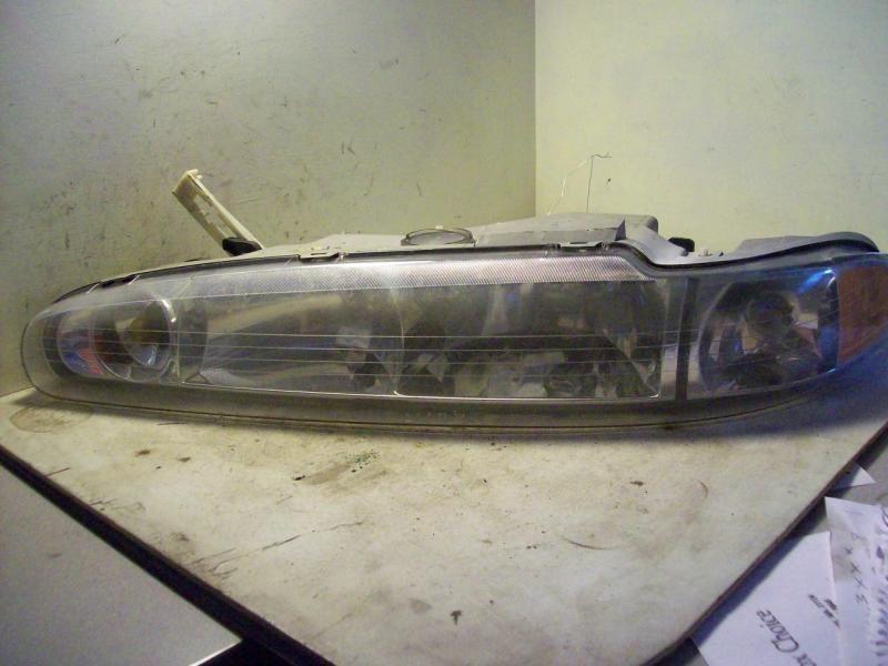 98 99 00 01 02 oldsmobile intrigue left headlight 45147