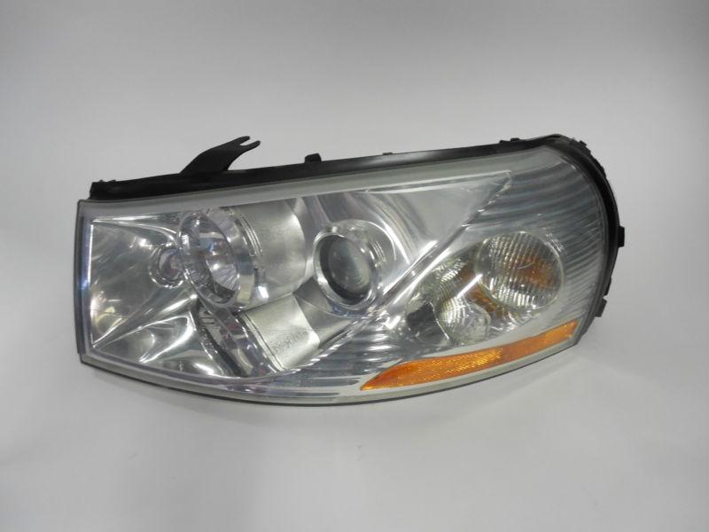 03 04 05 saturn l300 sedan oem left headlight nice! 