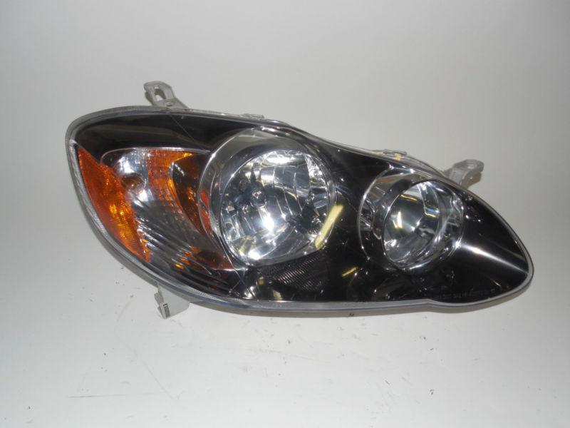 03 04 05 06 07 toyota corolla right headlight nice!