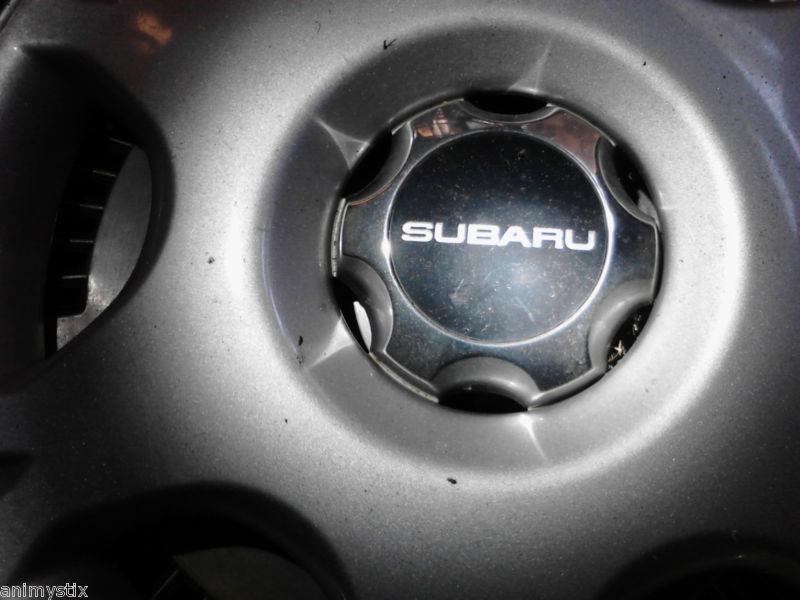 Nice subaru center cap (609) black w/ "subaru" text - bolt on style with bolts