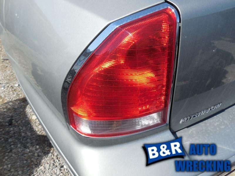 Left taillight for 02 03 diamante ~ chrome bezel 4944038