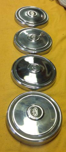 Vintage. ford mercury 14" hubcaps set of 4 , dog dish style