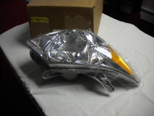 03 - 08 chevy vibe right head lamp assy.