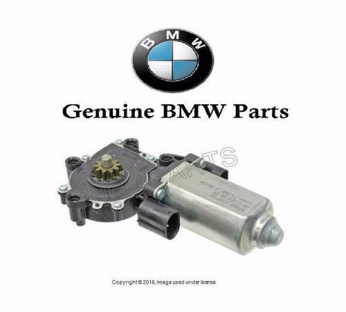 Bmw 318i 318is 325is 318ti m3 window motor with two terminal housing connectors.