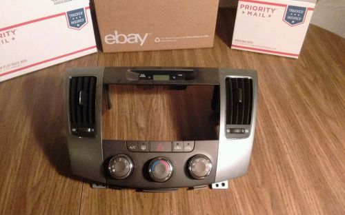 2009 hyundai sonata center dash radio bezel with manual climate controls