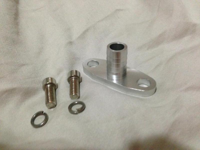 T3 or t4 oil drain flange fitting with bolts.