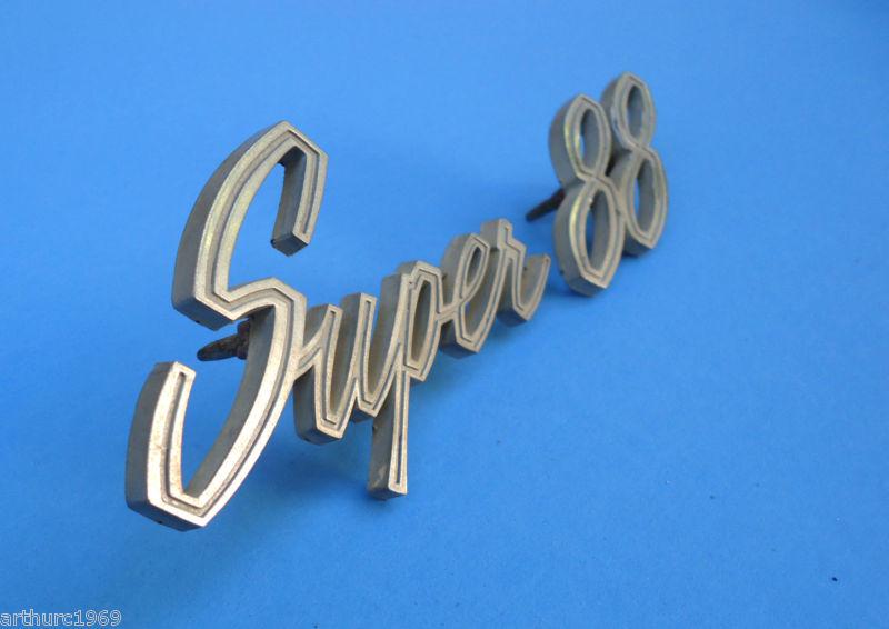 Oldsmobile trunk emblem 1960's 1964 oldsmobile super 88 oem trunk script emblem 