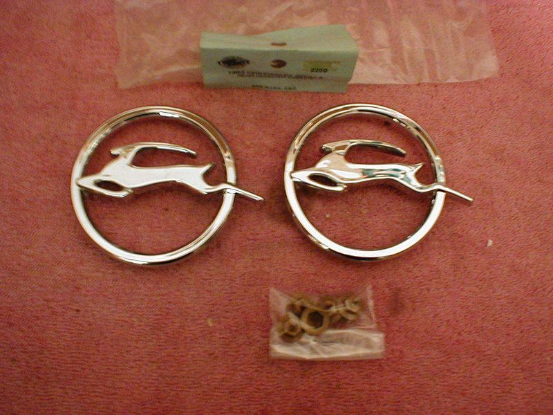 New 1963 chevy impala  rear quarter  circle emblems..