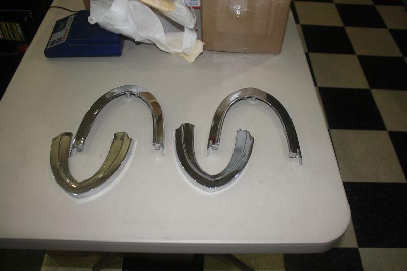 1958 chrysler tail light/back-up light retainers rechromed