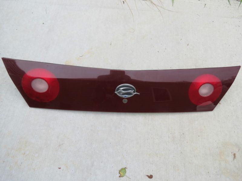  00 01 02 03 04 05 chevy impala trunk lid brake tail light panel