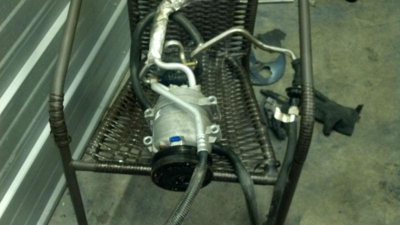 C5 corvette air conditioning compressor ,with lines