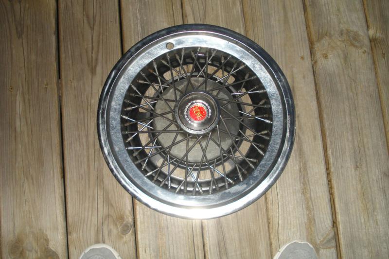 (1) one ford mustang,pinto,mercury bobcat wire hubcap