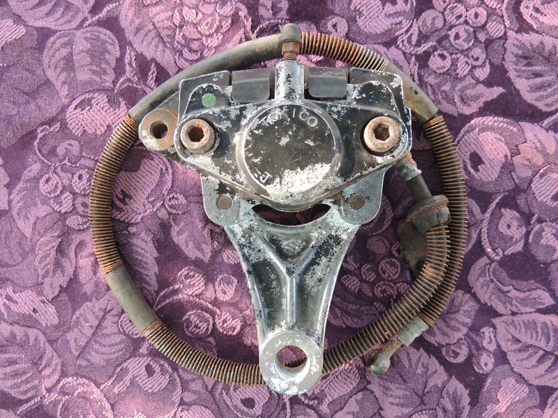 1977 kawasaki kz1000 rear brake caliper with brake line