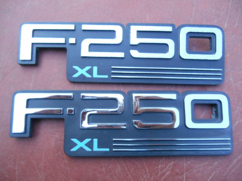 1990 s era ford f 250 xl fender emblem set  driver quality