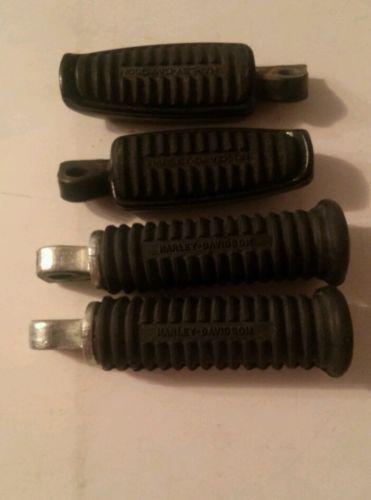 A nic set of harley davidson front and rear oem pegs