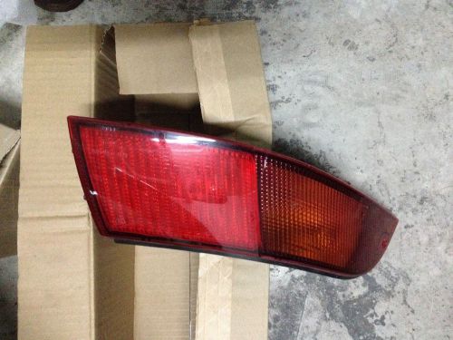 Tail light hella left 993.631.413.00 95-98 porsche 911 993