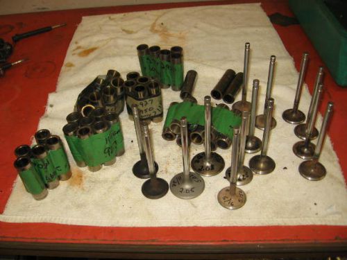 Misc lot of valves and wrist pins.