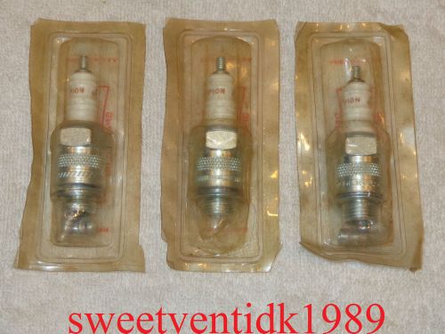 ‘nos’ champion j-11j spark plugs........marine inboard / outboard engines