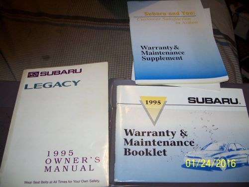 A owners manual&amp; other manuals for a 1995 subaru legacy in felt case