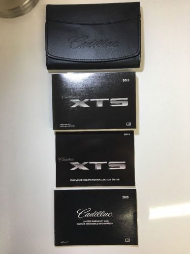 2015 cadillac xts owners manual set w/leather case. free priority s&amp;h #0213