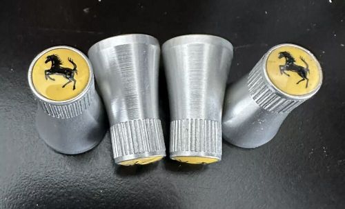 Ferrari tulip cone valve stem caps set of four new - hard to find!