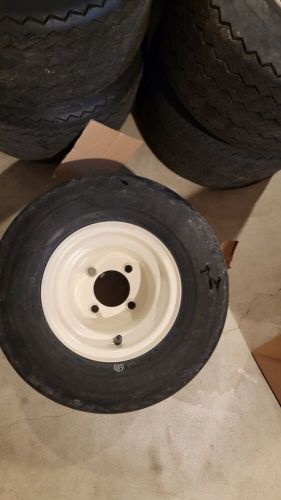 Ezgo golf cart wheel and tire and hubcap make me an offer