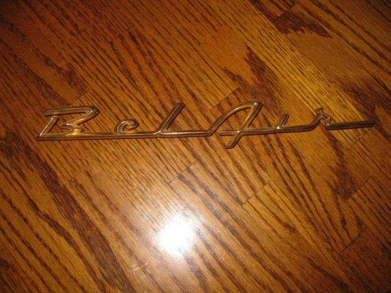 1957 chevy bel air gold-script emblem chevrolet