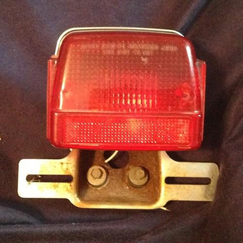 Suzuki gs250t  motorcycle tail light and license plate bracket