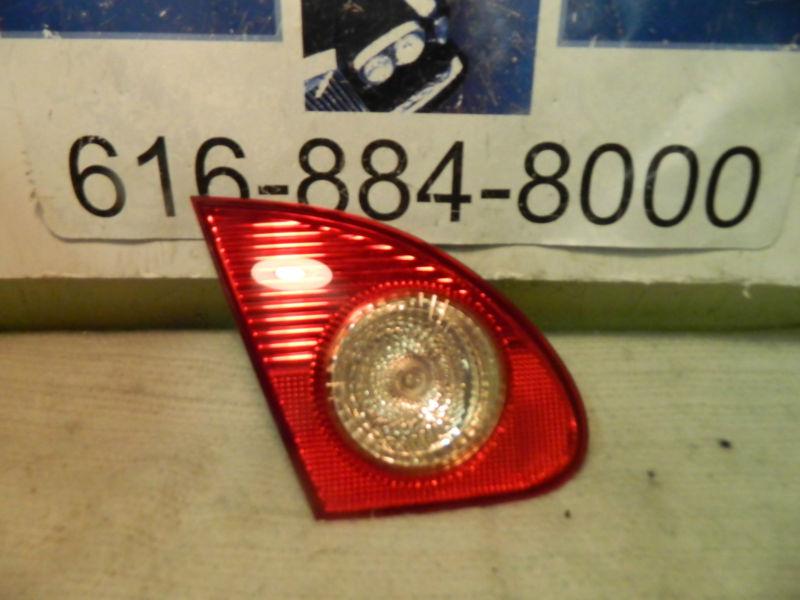 Toyota corolla 2003-2008 inner left/driver trunk lid mtd. tail light