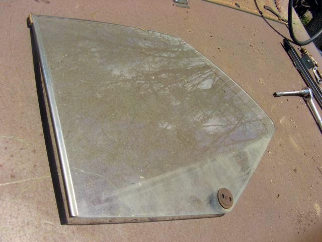 73 74 nova ventura omega apollo left rear 1/4 window glass non a/c no tint oem