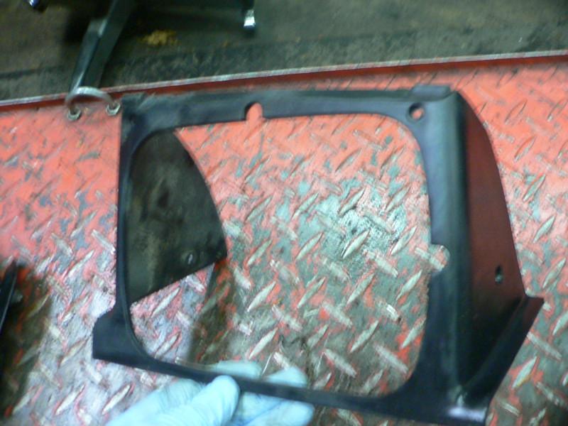 84 pontiac fiero left headlight trim part