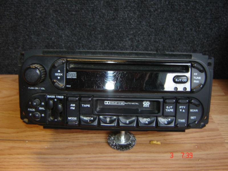 Chrysler factory oem am fm radio cd player w/ cassette p56038555am