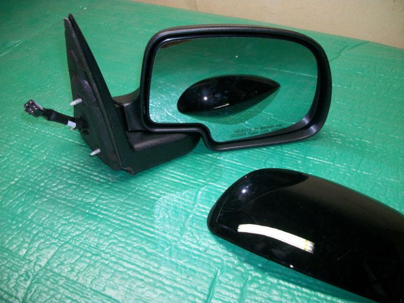 Gm # 88986366, factory brand new gm mirror, right side. shiny black cap 